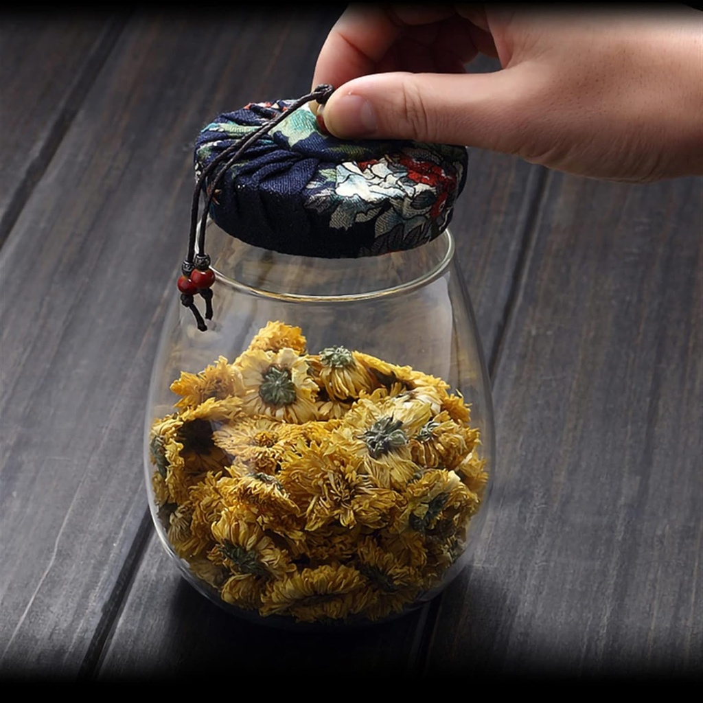 بطرمان 1000ملي بيضاوي بغطاء محكم الغلق مغطي بقماش مزخرف لحمل وتنظيم الكاندي والبلح في المطبخ او علي السفرة