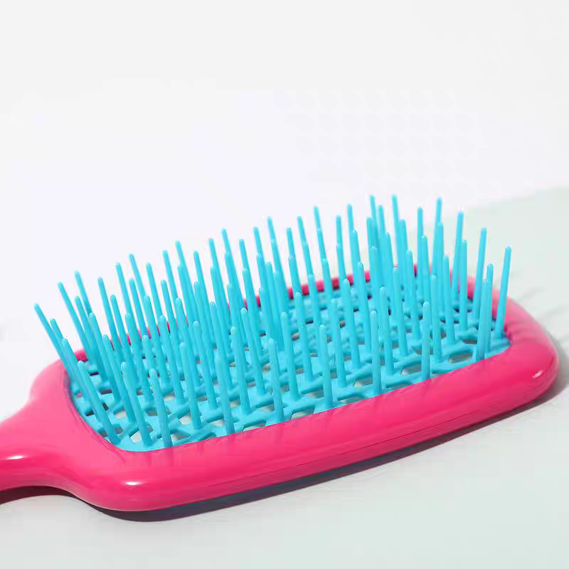 فرشة شعر مفرغة لتسريح وفك تشابك الشعر