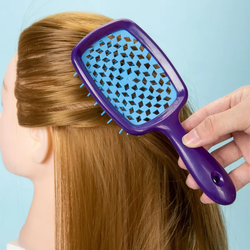 فرشة شعر مفرغة لتسريح وفك تشابك الشعر