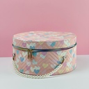 مجموعة شنط جلد 3 قطع بماقسات مختلفة بيضاوية الشكل لتنظيم وحمل الميك اب مزينة بقلوب