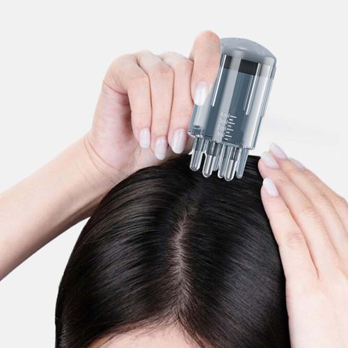 ديسبنسر توزيع لزيوت الشعر وتدليك الراس