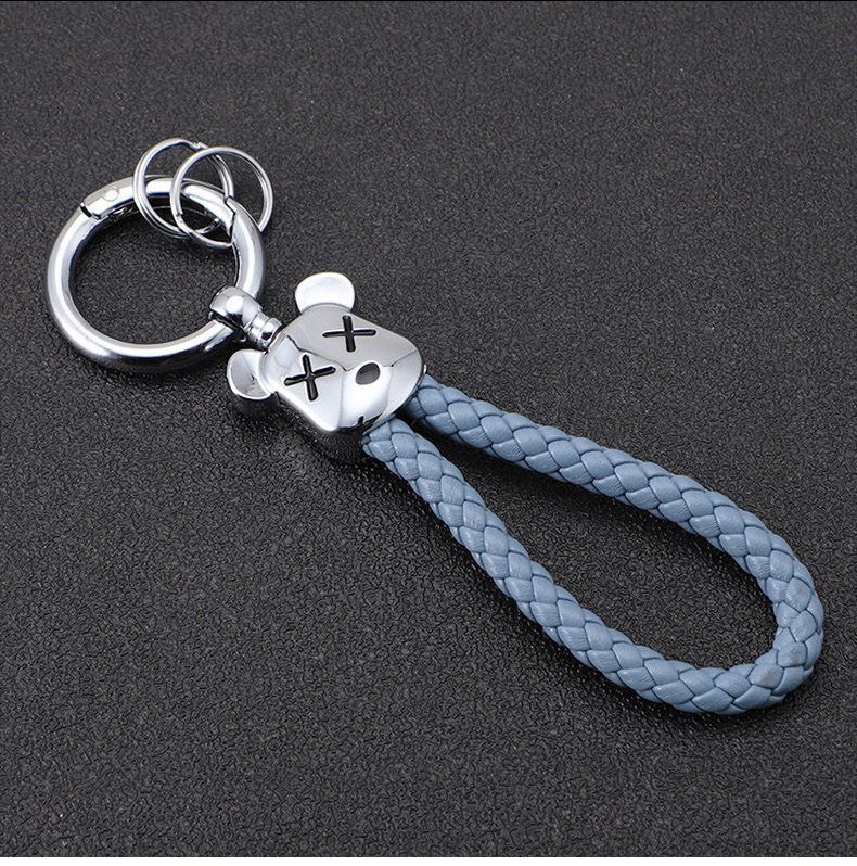 ميدالية من الجلد المضفر برأس دبدوب لمفاتيح السيارات والشنط