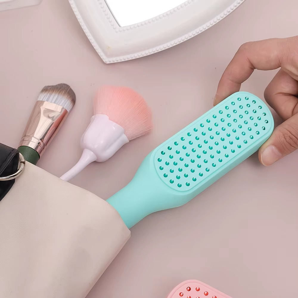 فرشة شعر لفك التشابك ذاتية التنظيف بتصميم قابل للسحب