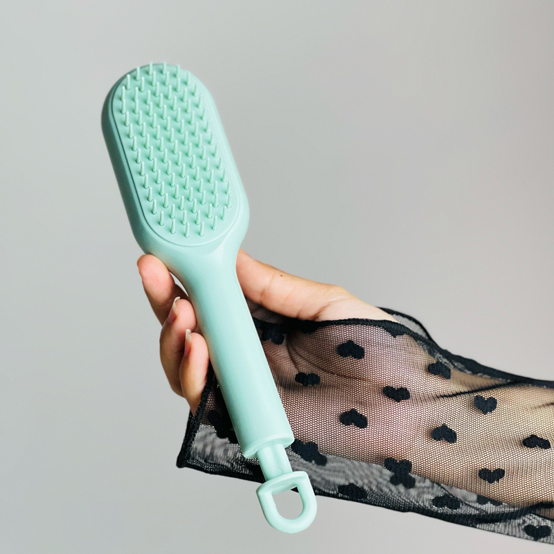 فرشة شعر لفك التشابك ذاتية التنظيف بتصميم قابل للسحب