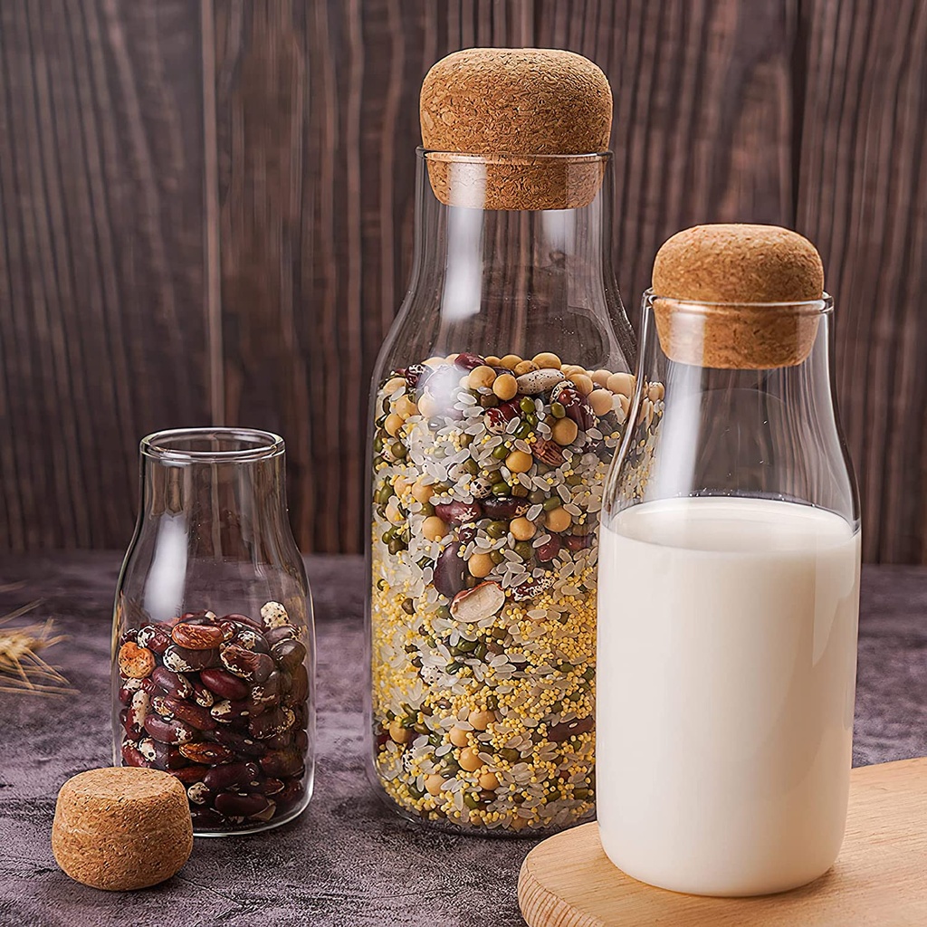 طقم زجاجات 3 قطع لحفظ وتنظيم الالبان والبقوليات والمكسرات زجاج شفاف بغطاء شكل خشبي محكم الغلق